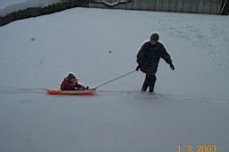 DCP_2364-Tyler and the snow pull.JPG